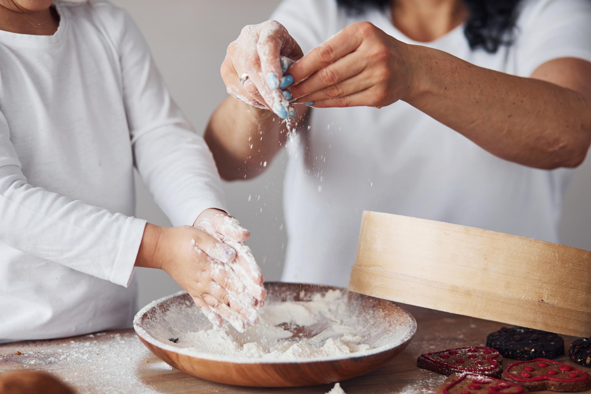 Students plating a dessert in workshop
